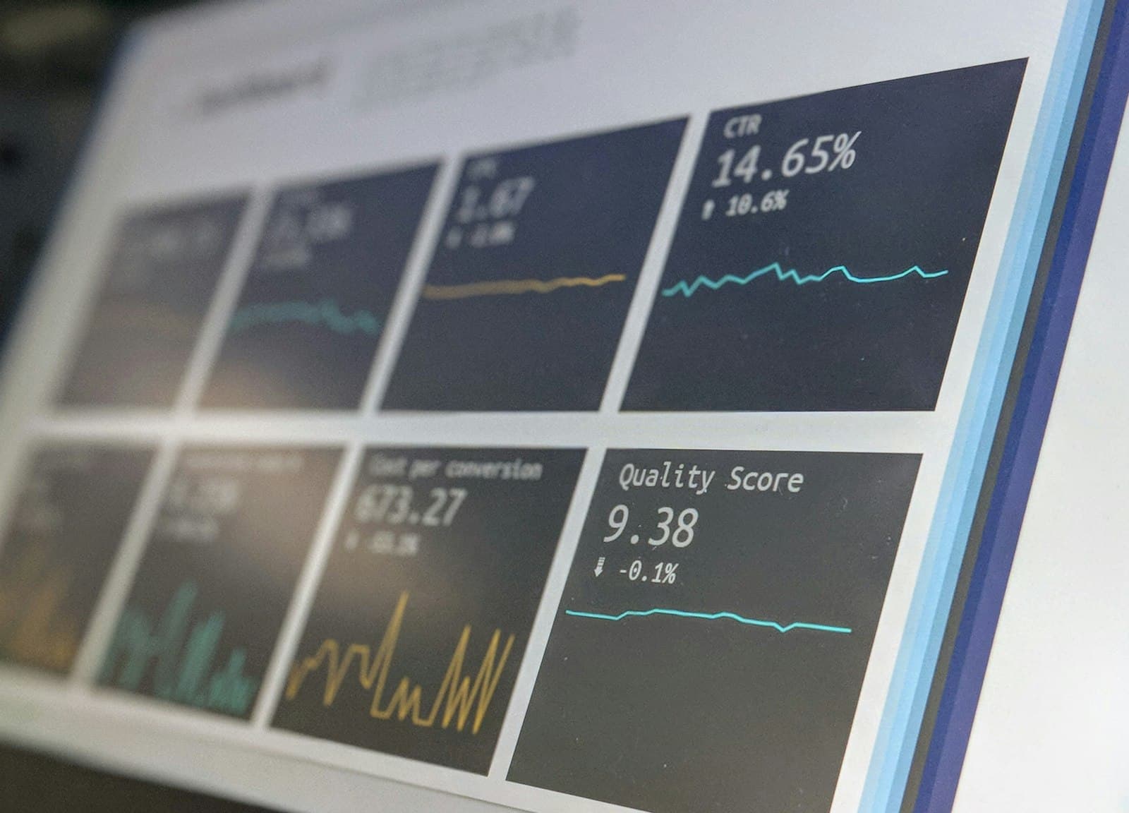 A close angled crop of a search and metrics dashboard on screen, in blue tones.